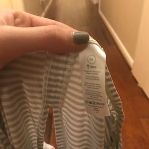 size 14 ivivva lounge shirt with slit in the back